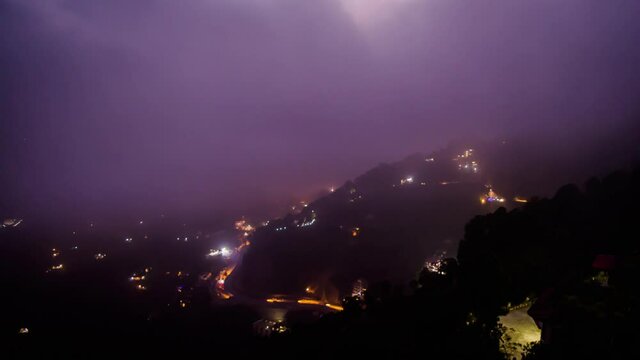 Time lapse Video of Traffic trails on kalka Shimla Highway with slow moving clouds, Curvy mountain road
