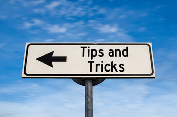 Tips and tricks road sign, arrow on blue sky background. One way blank road sign with copy space. Arrow on a pole pointing in one direction.