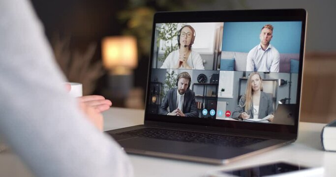 Woman in domestic clothing having online conversation with four colleagues on laptop. Business people discussing working problems on distance while staying at home.