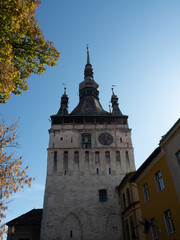 The unique Clock tower from 13th century, 5 turrets baroque roof with bulbs, located at the center...