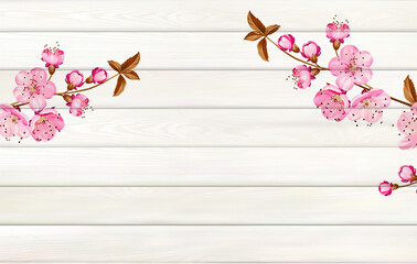 Tropical background for your design. Plumeria leaves on wooden background with empty space