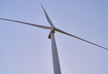 wind generators generate energy against the sky