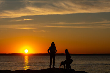 Fototapeta premium father and son at sunset