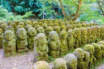 Fototapeta na wymiar Rakan sculptures at Otagi Nenbutsu-ji Temple in Kyoto, Japan. The temple was rebuilt in 1955.