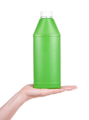 Hand with green plastic container with engine oil. Anti fungus detergent for bacthroom. Isolated on white background.