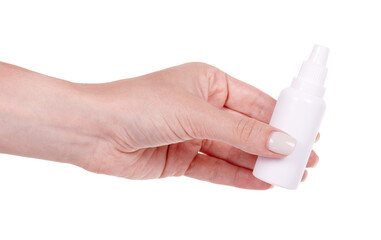 Hand with nasal drops in white container. Isolated on white background.