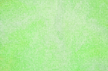 小さなドットのパターンの緑色の背景
