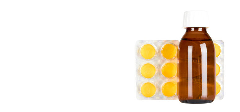 Throat ache pills in bister and syrup, isolated on white background. Copy space template, banner.