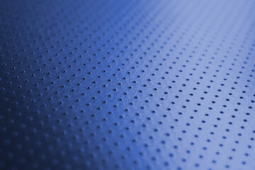 Industrial tinted blue background with bright saturated color. Perforated aluminum surface with...