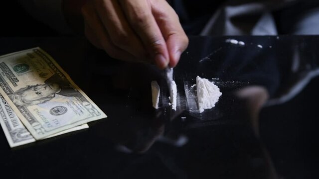 Checking a pack of cocaine narcotic drugs.