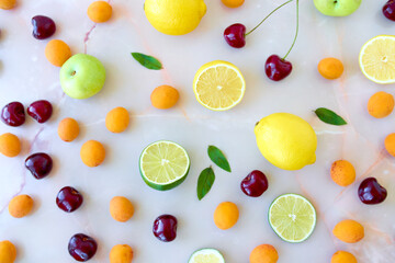 Bright tasty fruits and berries. Healthy nutrition, summertime concept. Colorfull backdrop