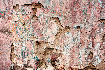 Texture of a concrete wall with cracks and scratches which can be used as a background