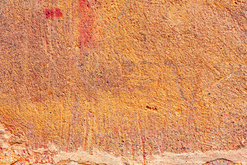 Texture of a concrete wall with cracks and scratches which can be used as a background