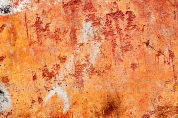 Texture of a concrete wall with cracks and scratches which can be used as a background