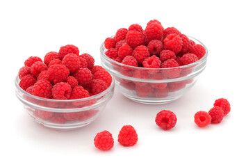 Raspberries in a glass bowls.