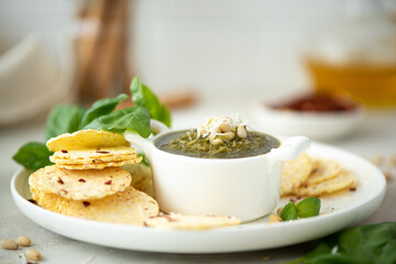 pesto sauce with pine nuts and corn bread