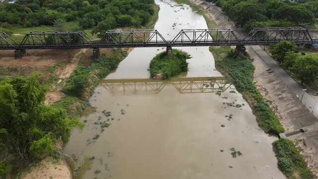 Aerial view of the Railway bridge on the River, Black bridge of lampang , Landscape of lampang Thailand.