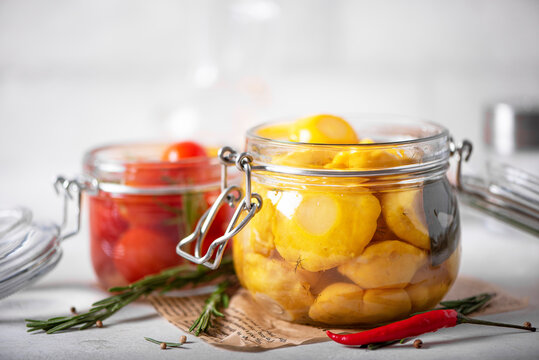 marinated squash with herbs, bay leaves and spices
