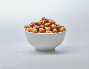 Fototapeta na wymiar Chickpeas & fava beans (foul) on white background