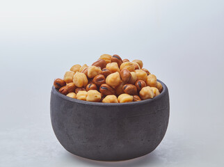 Fototapeta na wymiar Chickpeas & fava beans (foul) on white background