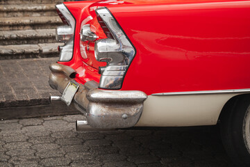 Vintage red car fragment, rear lights