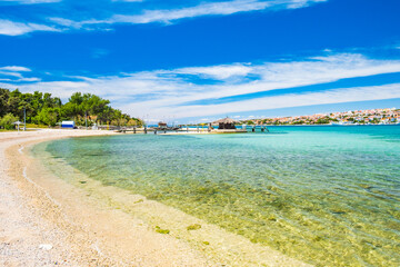 Adriatic sea shore in Croatia on Pag island, beautiful sand beach in town of Novalja
