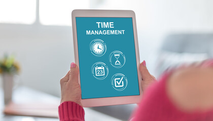 Time management concept on a tablet