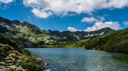 Fototapeta na wymiar Black pond in the Tatra valley