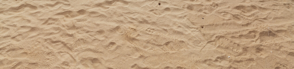 Fototapeta na wymiar Fußabdrücke im Sand Strand Panorama