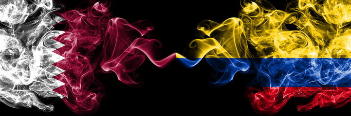 Qatar vs Colombia, Colombian smoky mystic flags placed side by side. Thick colored silky abstract smoke flags.