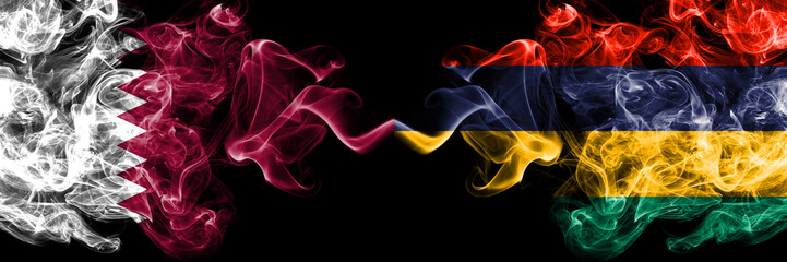 Qatar vs Mauritius, Mauritian smoky mystic flags placed side by side. Thick colored silky abstract smoke flags.