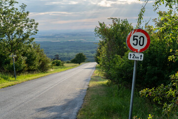 speed limit sign on the road
