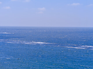 Naklejka na ściany i meble The mediterranean sea at Alexandria, Egypt. Background is a clear blue sky.
