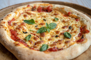 classic pizza margherita with mozzarella and basil, make pizza at home