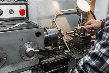 Master's hand. The old Metalworking machine, manufactured in the middle of the last century, is still in good condition.