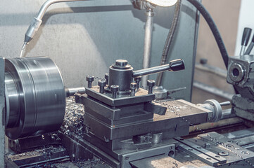 old Metalworking machine, manufactured in the middle of the last century, is still in good condition. The use of old technologies in times of crisis and stagnation