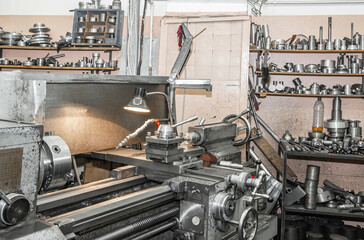 Turning production. Storage of finished metal products on racks. Using old technologies in times of crisis and stagnation