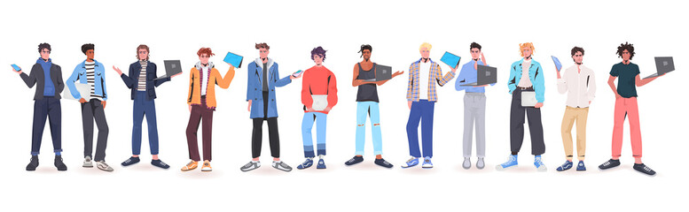 Fototapeta premium set men holding digital devices mix race guys in trendy clothes male cartoon characters collection horizontal full length isolated vector illustration
