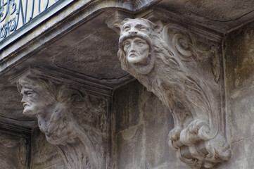 console of balcon decoration neoclassicism style  in the form of lion with face man © DenisDavidoff