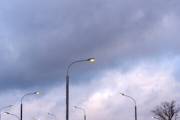 Street lights on the background of the srachny twilight sky. Soft focus