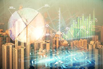 Forex chart on cityscape with skyscrapers wallpaper double exposure. Financial research concept.