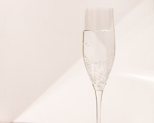 beautiful isolated wine glass on a light geometric background