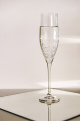 beautiful isolated wine glass on a light geometric background