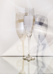 transparent glass with carbonated liquid on a white background and multiplied shadow	