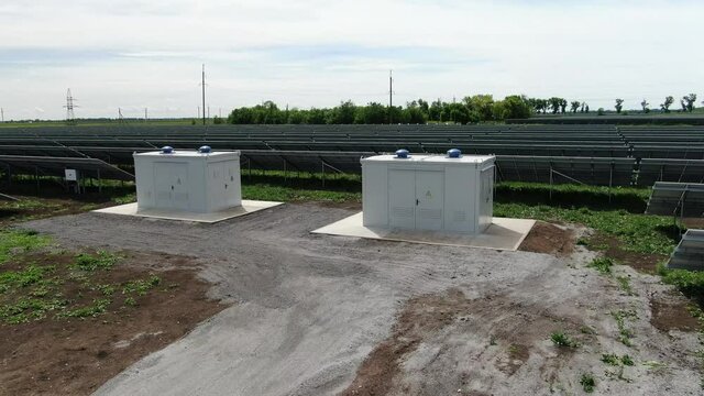 Point of interest shot of two transformers at the solar power station, 4k