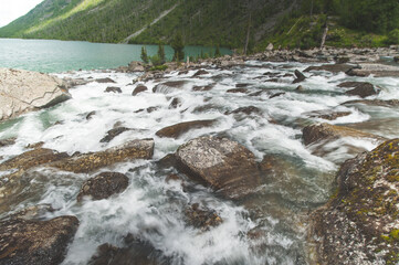 noises on the multi-mountain lakes in the Altai Mountains.