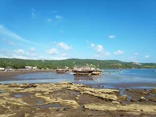 tropical beach with boats