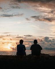 couple on the beach at sunset