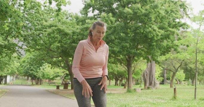Senior woman running in the park