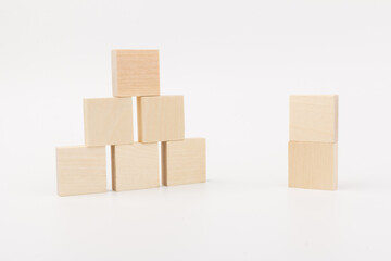 Obraz premium Wooden blocks to build a wall. Concept of new business, partnership, integration and startup